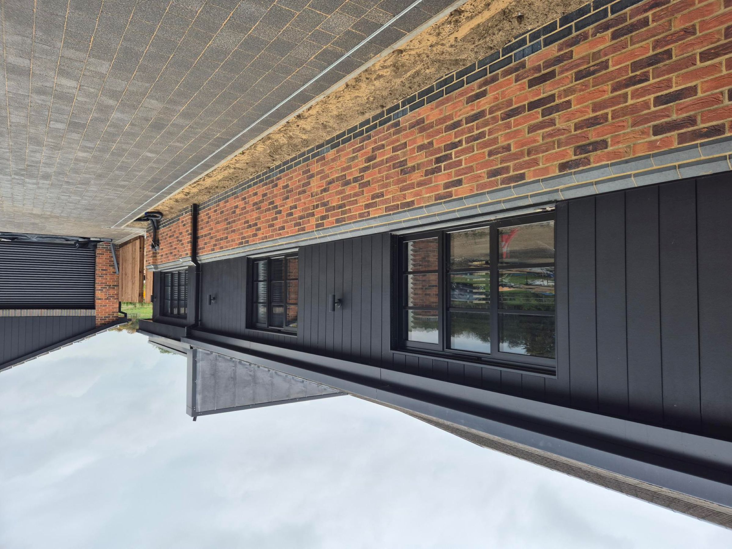 Aluminium box guttering on a modern new build house - Alugutter